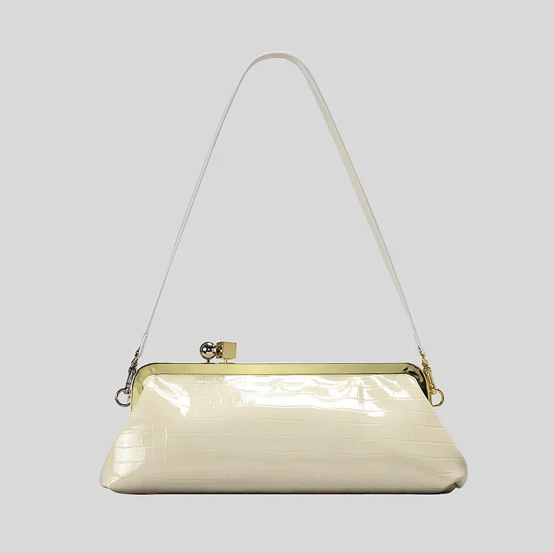 Long frame clutch with kiss lock closure