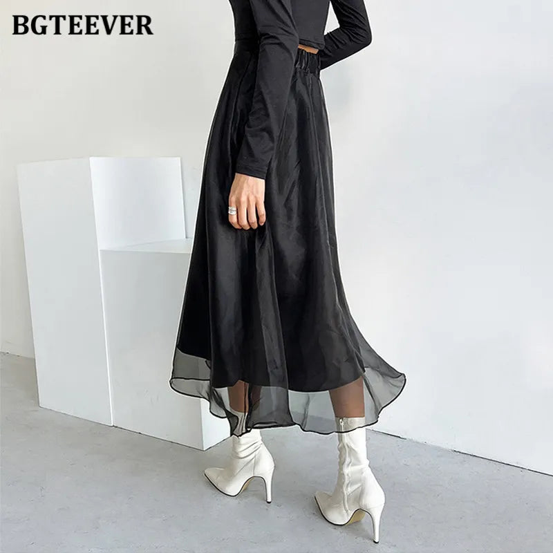 A-line mid-length mesh skirt with high waist and loose fit