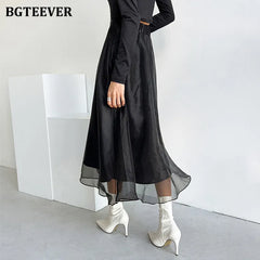 A-line mid-length mesh skirt with high waist and loose fit