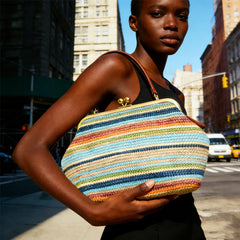 Shell clutch in striped woven straw