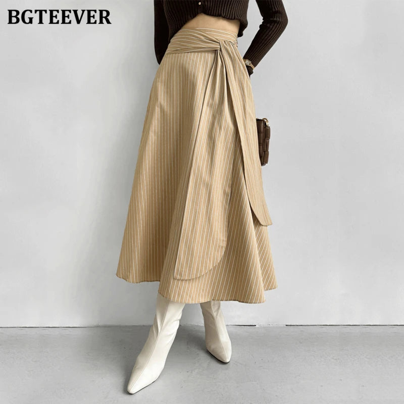 A-line long striped skirt with lace-up and irregular hem