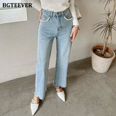 High waist loose jeans with pearl button detail