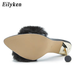 Pointed toe stiletto mule with fluffy fur detail